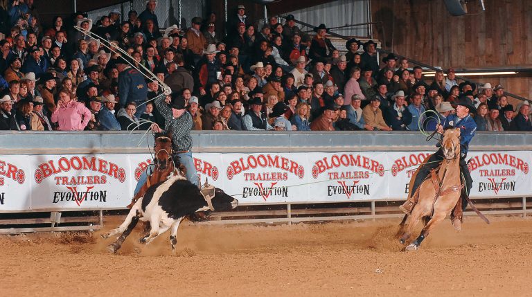 Colter Todd roping with Travis Graves at the Wildfire Open to the World in 2007.