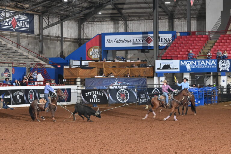 Ace Ashford and Jade Philipp team roping