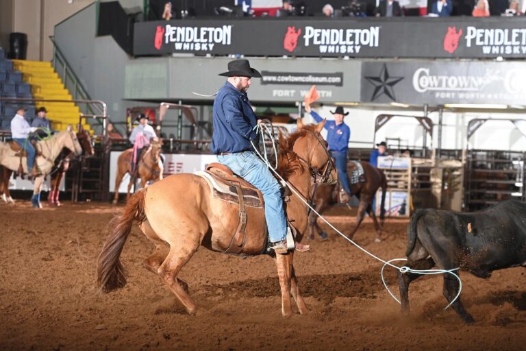 Kelsey Willis heeling at the Military/First Responder Roping at the American Hero Celebration in 2023.