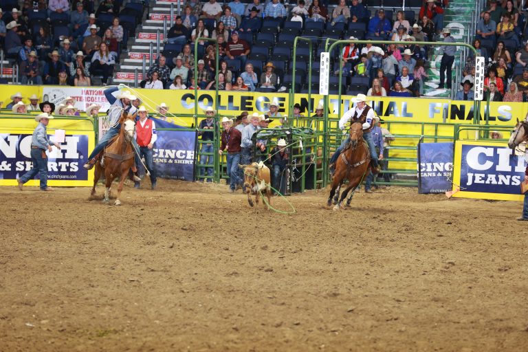 Cam Jensen and Tanner McInerney roping their third-round steer at the 2023 CNFR.